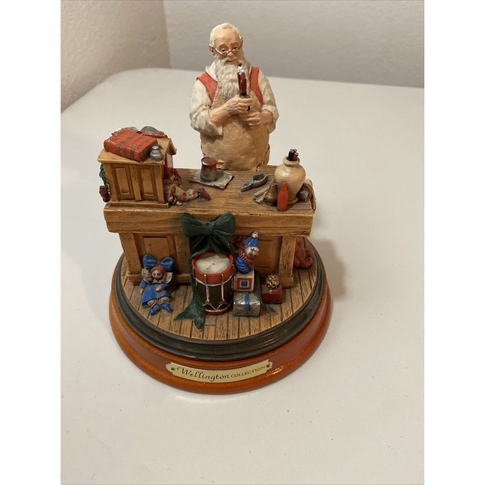 1990 Numbered Santa’s Workshop Figurine with base Rockwell Heirloom Collection.